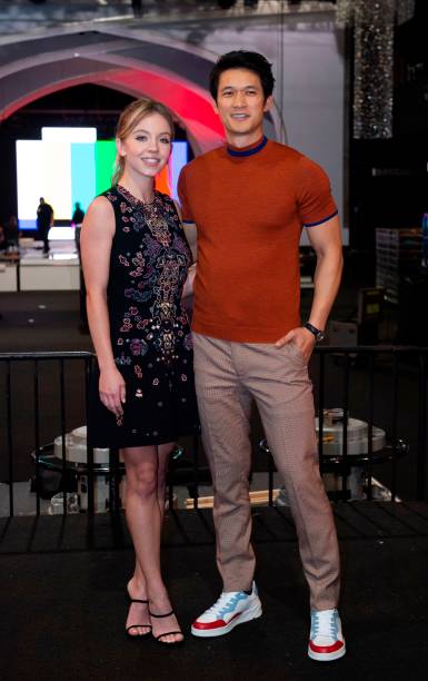 Actors Sydney Sweeney and Harry Shum Jr. Pose during the "Cocktails with the SAG Awards: A Behind-the-Scenes Experience" event at the Shrine Auditorium in Los Angeles on January 24, 2019.