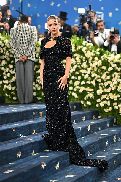 Actress Sydney Sweeney arrives for the 2025 Met Gala at the Metropolitan Museum of Art on May 5 in New York. The Gala raises money for the Metropolitan Museum of Art's Costume Institute. The 2025 Met Gala is themed "Tailored for You," aligning with the Costume Institute's exhibition, "Superfine: Tailoring Black Style," set to open to the public on May 10 — frame 39/73 (408×612)