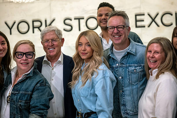 Actress Sydney Sweeney stands with American Eagle Outfitters executives on the floor of the New York Stock Exchange a...