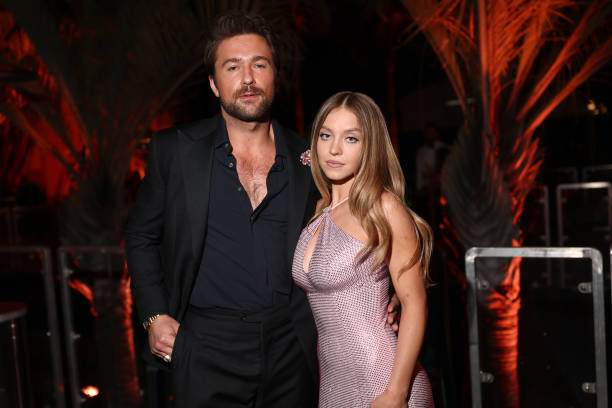 Brandon Sklenar and Sydney Sweeney attend the 2025 Vanity Fair Oscar Party Hosted By Radhika Jones at Wallis Annenberg Center for the Performing Arts on March 02, 2025 in Beverly Hills, California — frame 66/179 (612×408)