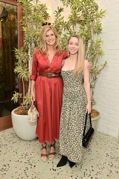 Connie Britton and Sydney Sweeney attend the Glamour x Tory Burch Luncheon Celebrating the Emmys at Holloway House on September 10, 2022 in West Hollywood, California (408×612)