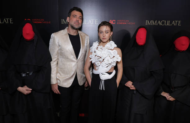 Director Michael Mohan and Sydney Sweeney are seen at the Beyond Fest Premiere of Neon’s IMMACULATE at The Egyptian Theatre Hollywood on March 15, 2024 in Los Angeles, California — frame 3/10 (612×399)