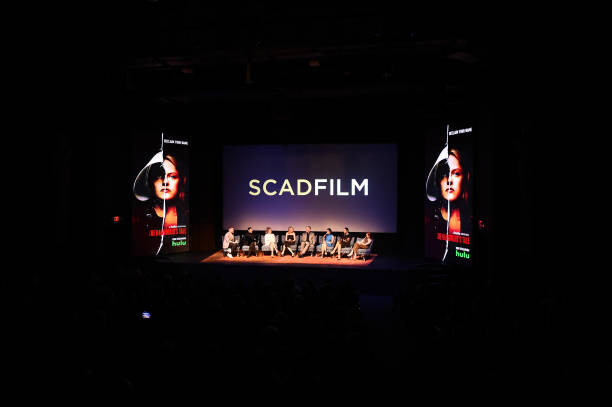 Eric Wilson, Ane Crabtree, Sydney Sweeney, Ever Carradine, Robert Curtis Brown, Nina Kiri, Amanda Brugel, and Madeline Brewer speak at SCAD FASH premiere of "The Handmaid's Tale" Exhibition at SCADshow on April 30, 2018 in Atlanta, Georgia — frame 5/5 (612×407)
