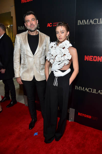 Michael Mohan and Sydney Sweeney at the Los Angeles premiere screening of "Immaculate" held during Beyond Fest at The Egyptian Theatre Hollywood on March 15, 2024 in Los Angeles, California.