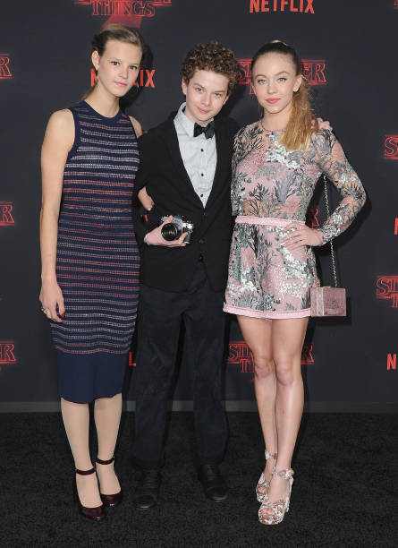 Peyton Kennedy, Quinn Liebling, and Sydney Sweeney arrive at the premiere of Netflix's "Stranger Things" Season 2 at Regency Bruin Theatre on October 26, 2017 in Los Angeles, California.
