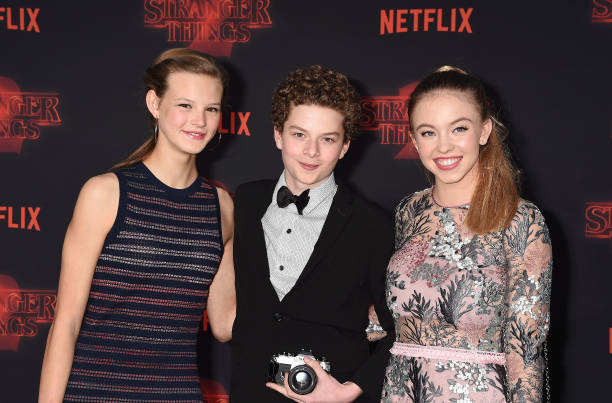 Actors Peyton Kennedy, Quinn Liebling and Sydney Sweeney arrive at the Premiere Of Netflix's 'Stranger Things' Season 2 at Regency Westwood Village Theatre on October 26, 2017 in Los Angeles, California.