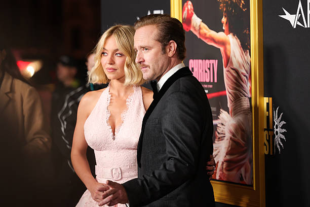 Sydney Sweeney and Ben Foster arrive at the "Christy" Premiere during 2025 AFI FEST at TCL Chinese Theater on October 25, 2025 in Hollywood, California — frame 169/191 (612×408)