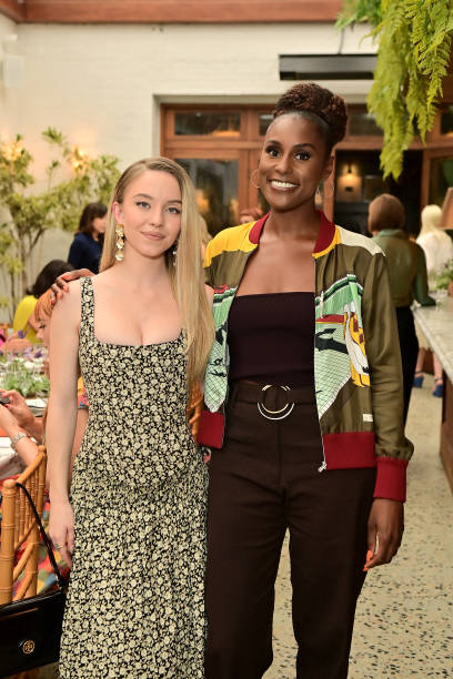 Sydney Sweeney and Issa Rae attend the Glamour x Tory Burch Luncheon Celebrating the Emmys at Holloway House on September 10, 2022 in West Hollywood, California (408×612)