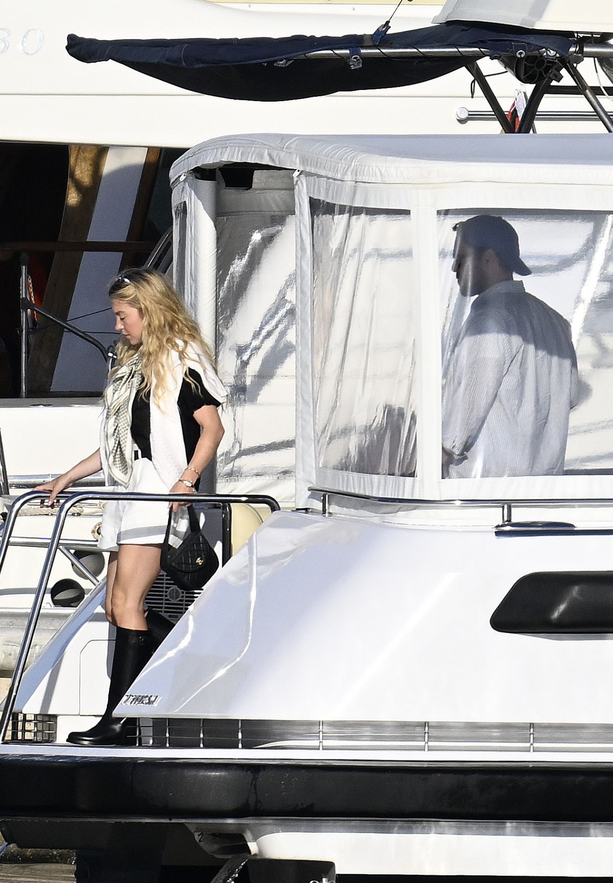 Sydney Sweeney Arrives at a Small Harbour in Palma