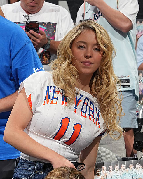 Sydney Sweeney attends the game between the New York Knicks and San Antonio Spurs during Game Five of the 2026 NBA Finals on June 13, 2026 at Frost Bank Center in San Antonio, Texas. NOTE TO USER: User expressly acknowledges and agrees that, by downloading and or using this photograph, User is consenting to the terms and conditions of the Getty Images License Agreement. Mandatory Copyright Notice: Copyright 2026 NBAE (490×612)