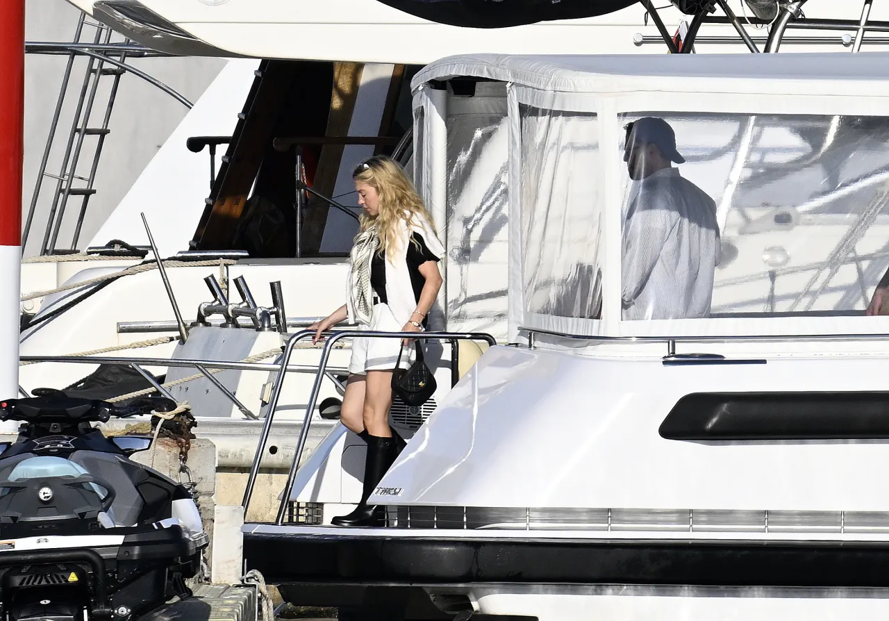 Sydney Sweeney Black Boots and White Shorts in Pal