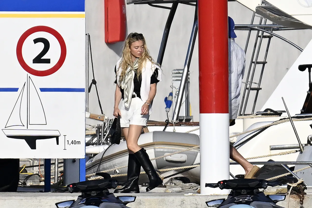 Sydney Sweeney Black Boots and White Shorts in Pal