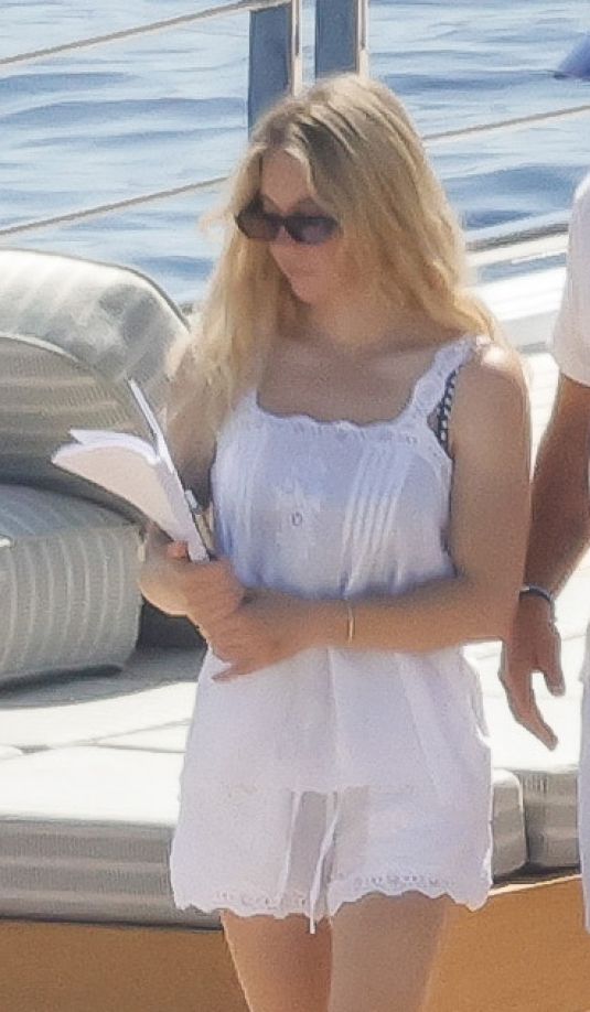 Sydney Sweeney Holding a Script While Enjoying