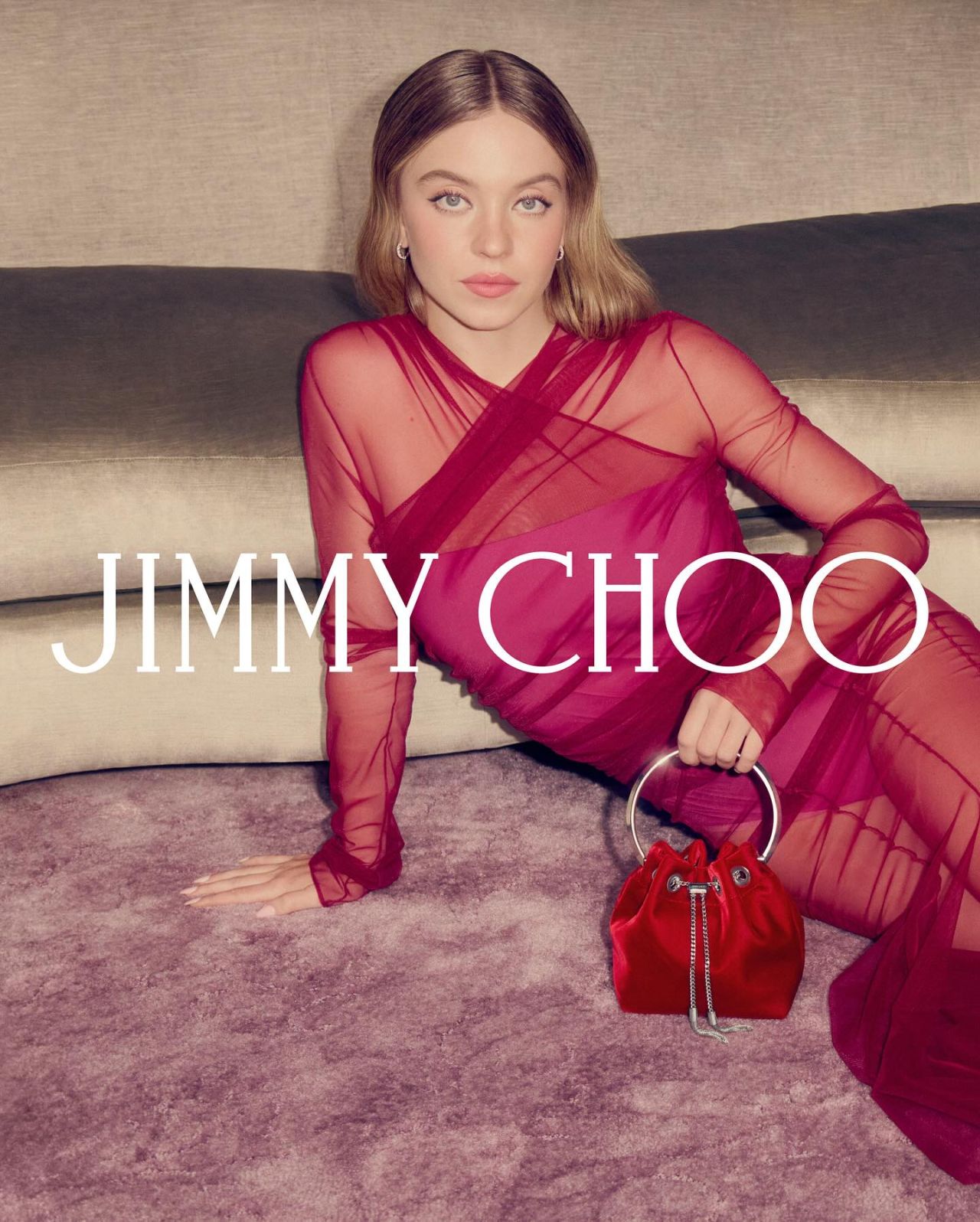 Sydney Sweeney in Sheer Magenta Dress for Jimmy Choo Winter 2025 Campaign — frame 13/40 (1280×1596)