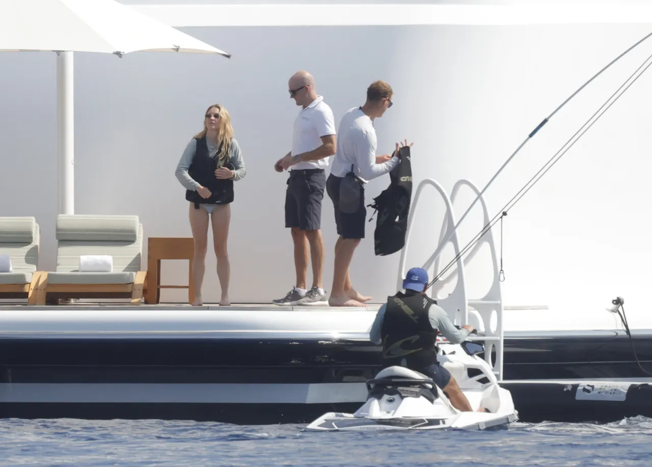Sydney Sweeney Sage Rash Guard in Mallorca August