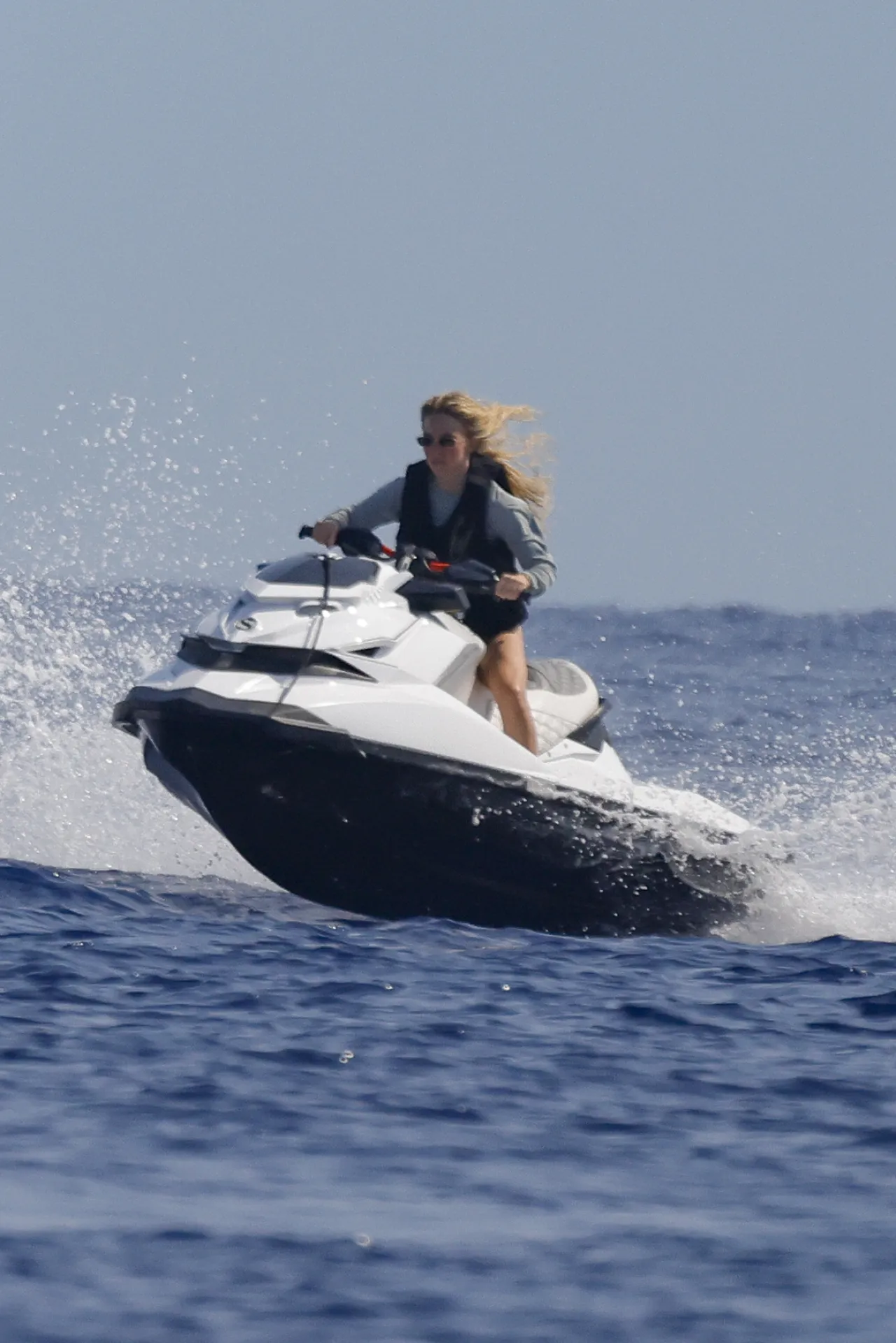 Sydney Sweeney Sage Rash Guard in Mallorca August