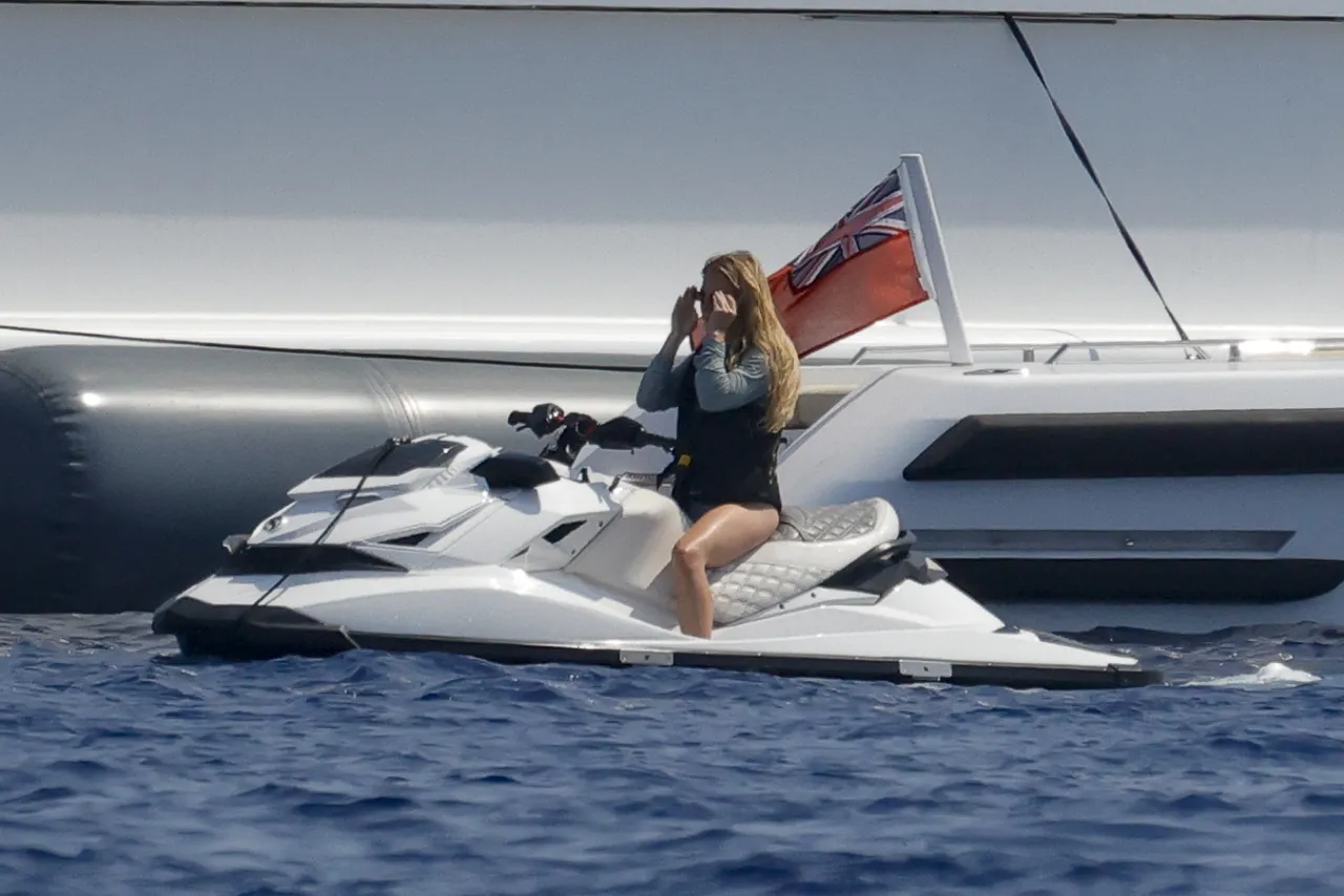 Sydney Sweeney Sage Rash Guard in Mallorca August