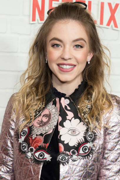 Sydney Sweeney wearing coat by Jean Baptiste attends Netflix premiere Everything Sucks! season 1 at AMC 34th street.