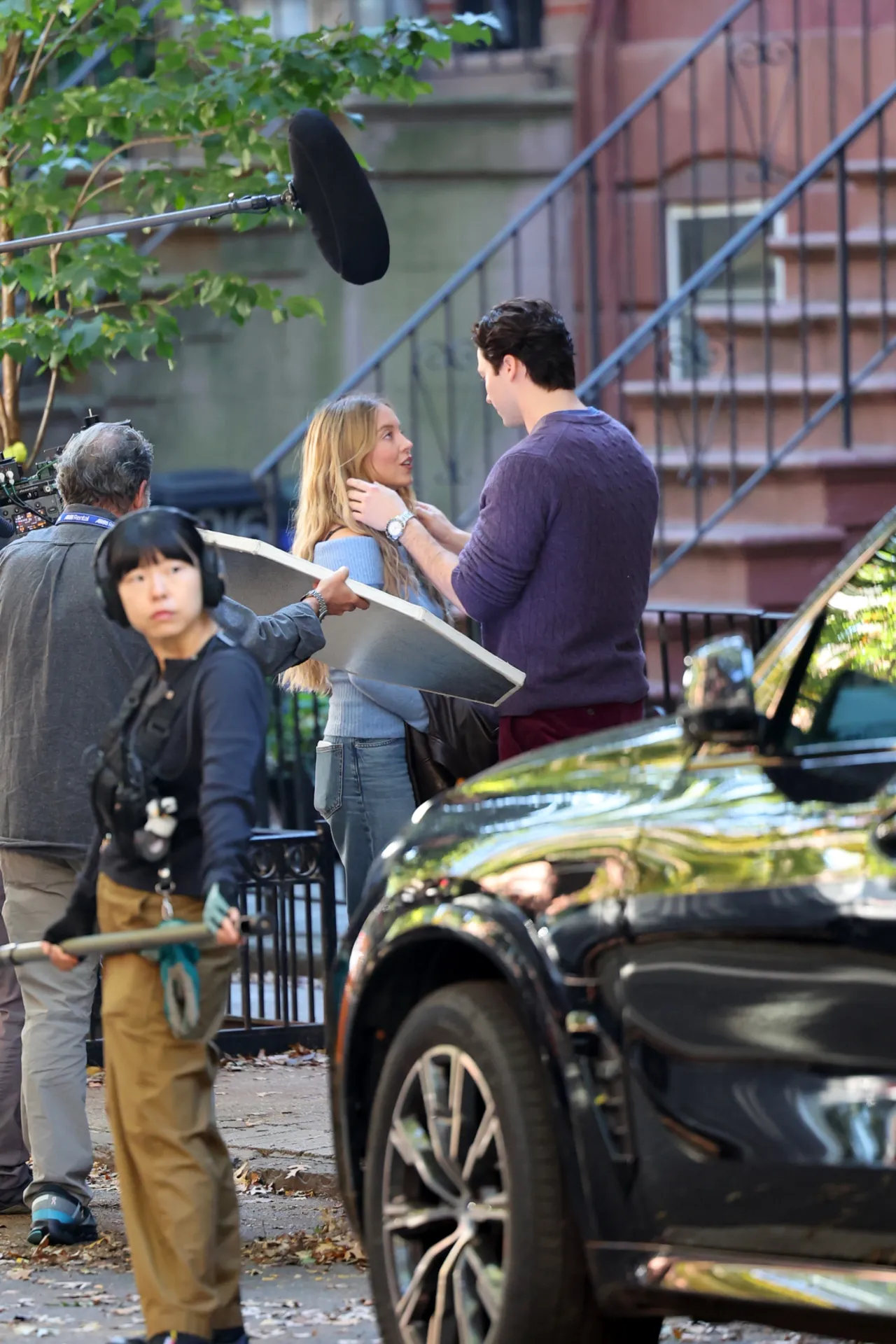 Sydney Sweeney Wears a Blue Off Shoulder Sweater