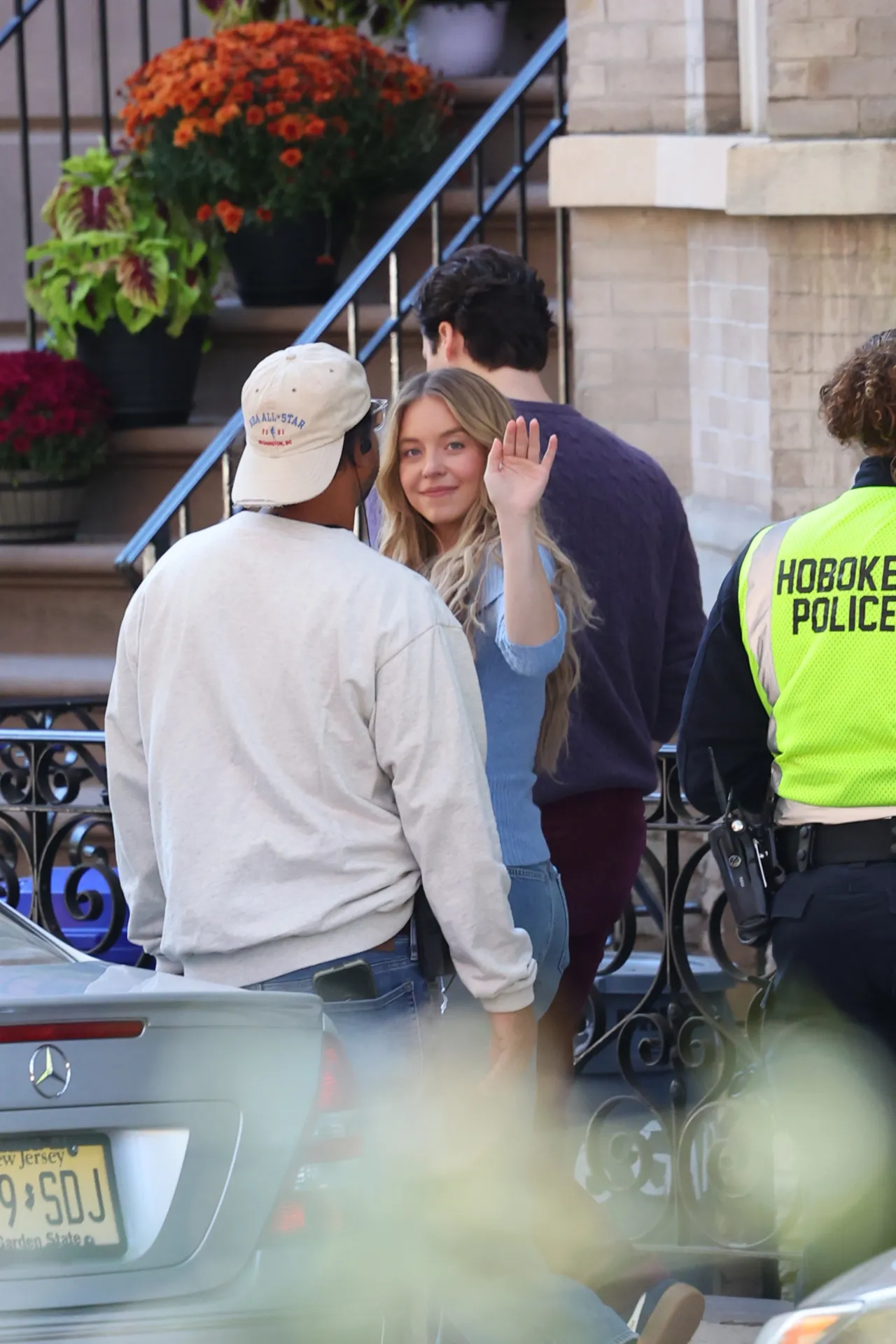 Sydney Sweeney Wears a Blue Off Shoulder Sweater
