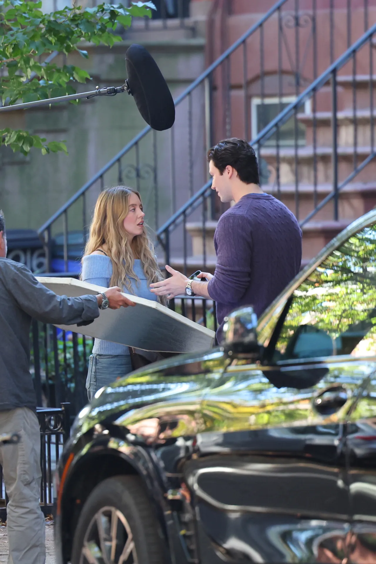 Sydney Sweeney Wears a Blue Off Shoulder Sweater