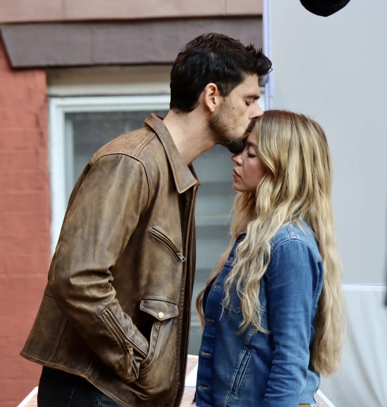 Sydney Sweeney Wears a Denim Jacket and Brown Carg