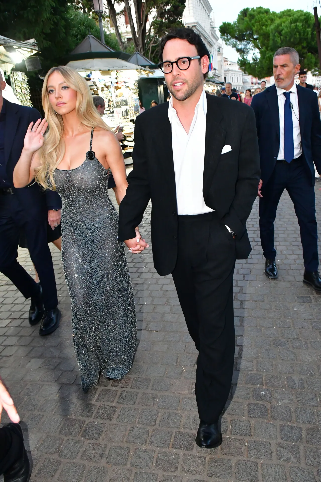 Sydney Sweeney Wears Embellished Black Gown at Arm