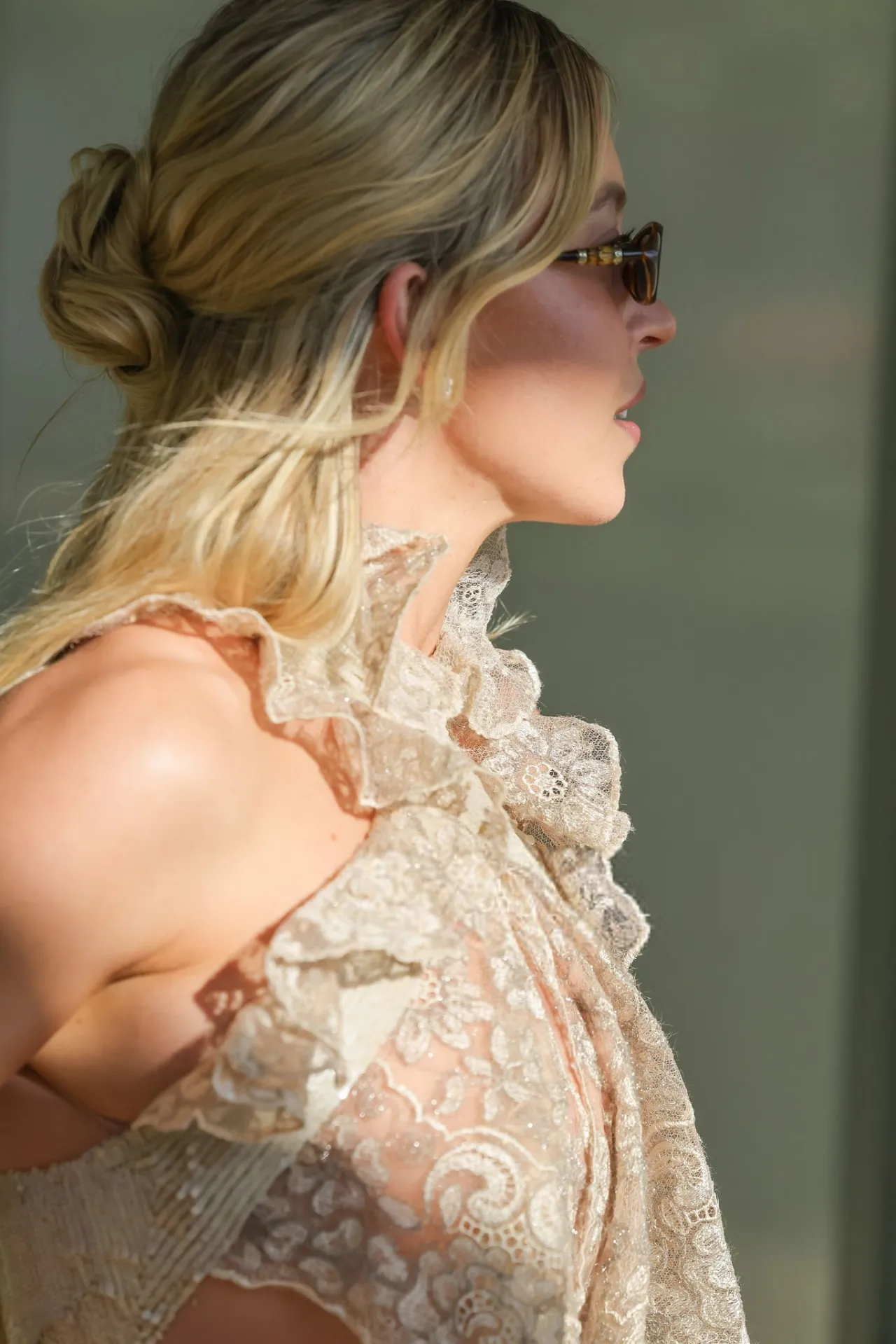 Sydney Sweeney Wears Lace Halter Top at Venice Air