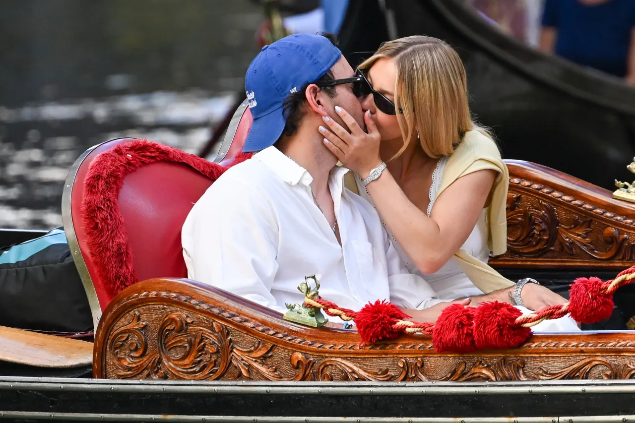 Sydney Sweeney Wears White Midi Dress on Gondola