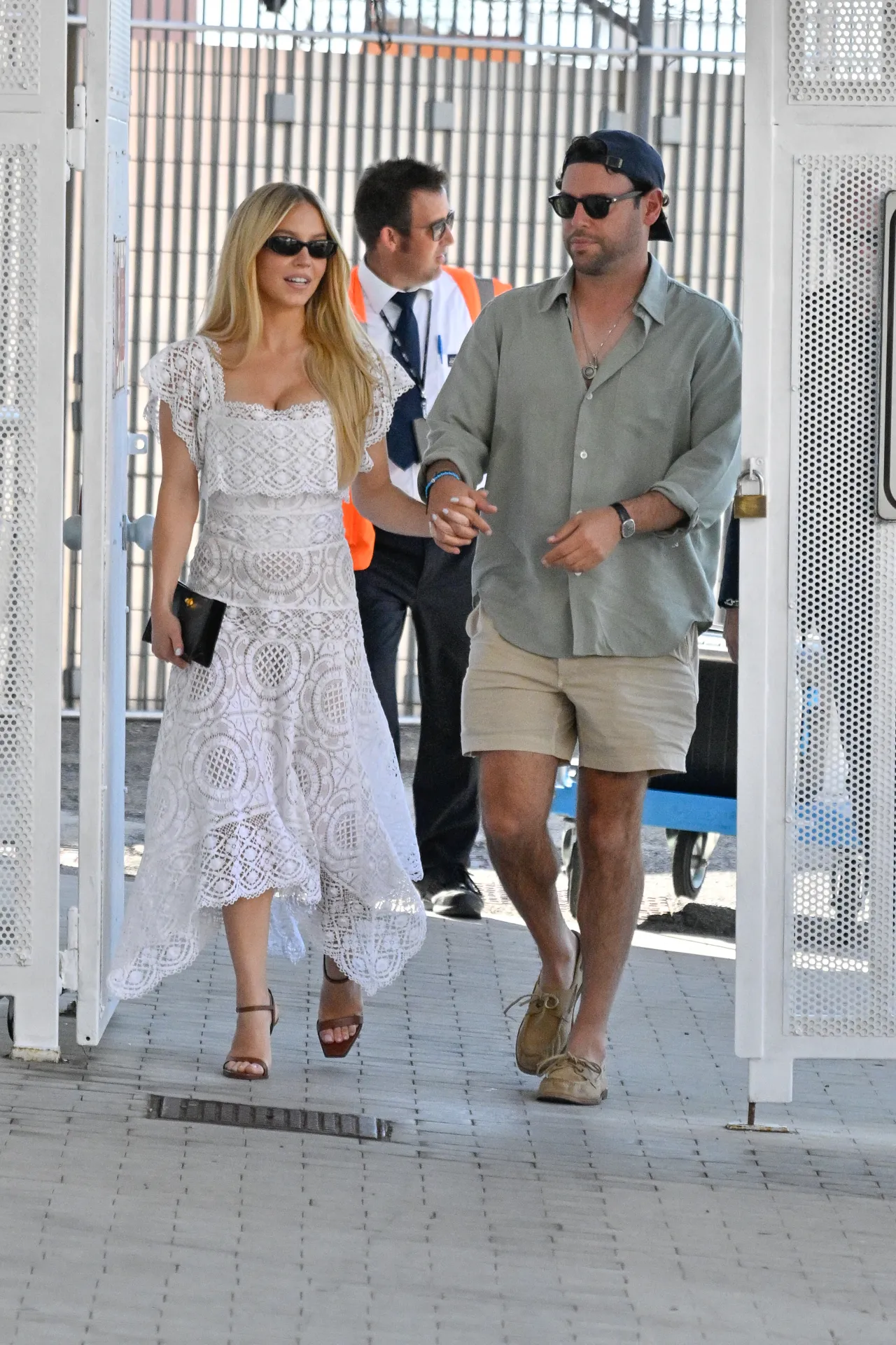 Sydney Sweeney Wears White Openwork Midi Dress
