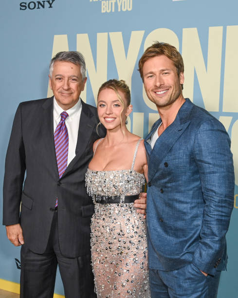 Tony Vinciquerra, Sydney Sweeney and Glen Powell at the "Anyone But You" premiere held at AMC Lincoln Square on December 11, 2023 in New York, New York.